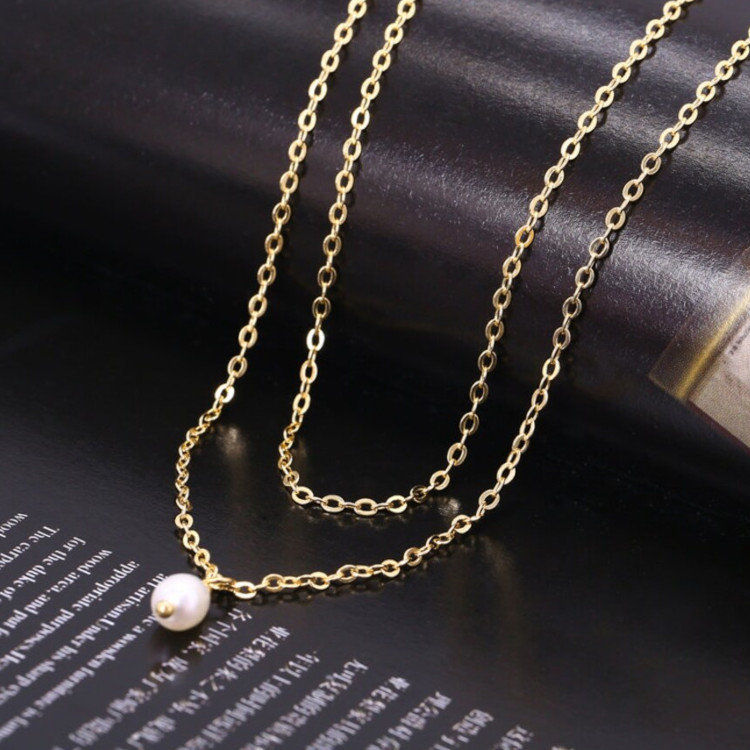 Collier chaine double pendentif perle